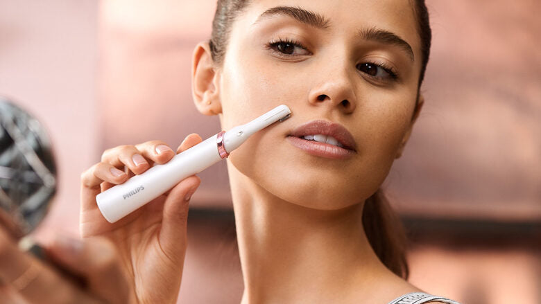 Philips Rifinitore a penna per ritocchi istantanei per corpo e viso