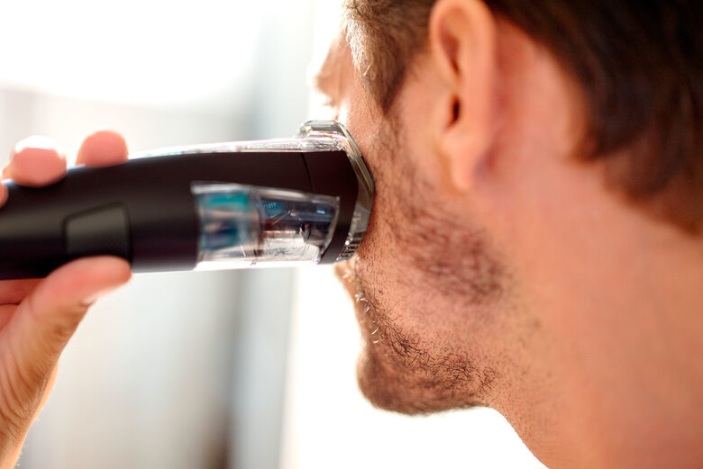Philips BEARDTRIMMER Series 7000 Regolabarba con sistema aspirante BT7202/16