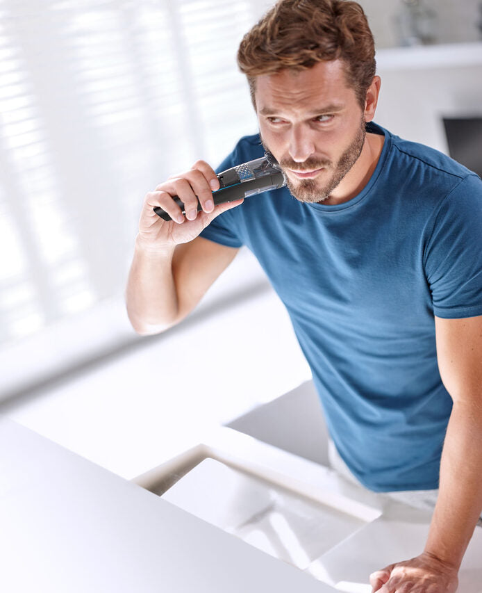 Philips BEARDTRIMMER Series 7000 Regolabarba con sistema aspirante BT7202/16
