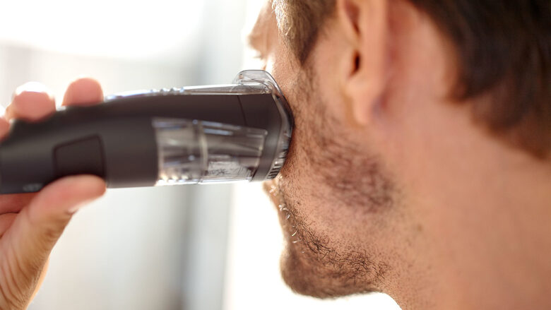 Philips BEARDTRIMMER Series 7000 Regolabarba con sistema aspirante, regolazioni da 0,5 mm