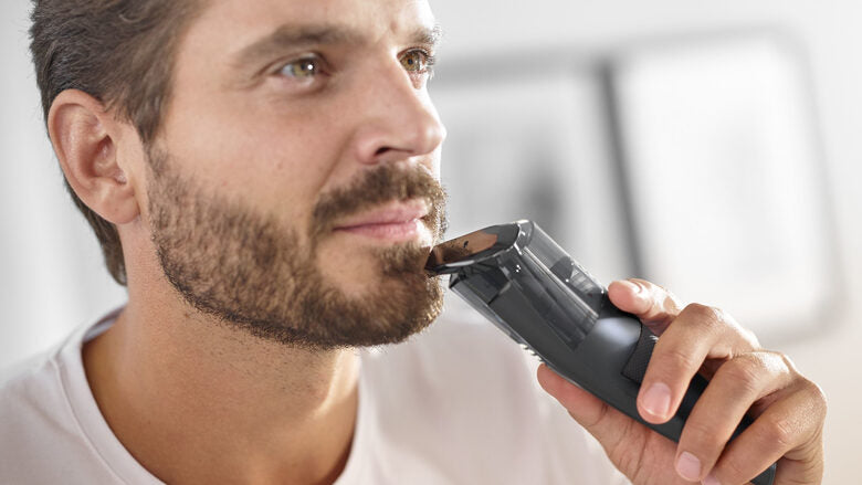 Philips BEARDTRIMMER Series 7000 Regolabarba con sistema aspirante, regolazioni da 0,5 mm