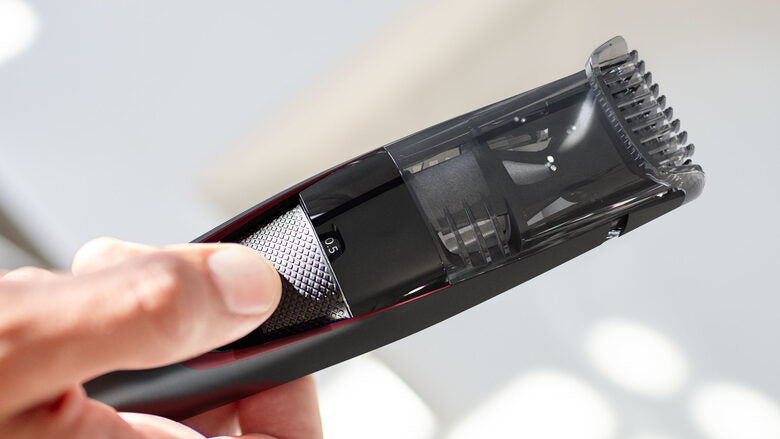 Philips BEARDTRIMMER Series 7000 Regolabarba con sistema aspirante, regolazioni da 0,5 mm