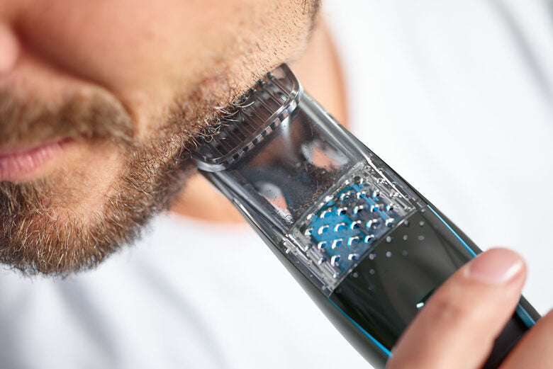 Philips BEARDTRIMMER Series 7000 Regolabarba con sistema aspirante BT7202/16